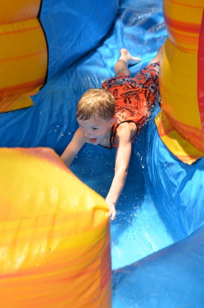 We had a blast hosting a community Summer Water Slide Party on the front lawn of our joint offices at the historic Bacon-Fraser House. Thank you to Perfect Portraits for capturing these special memories!