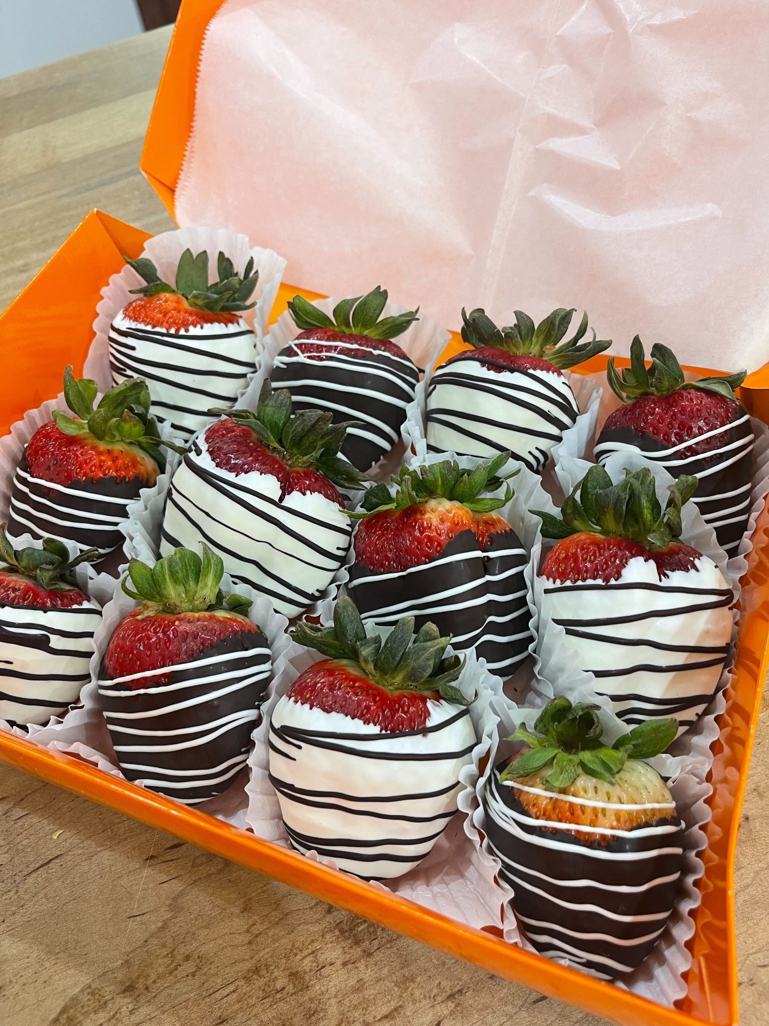Chocolate covered strawberries by Delectable Fruits