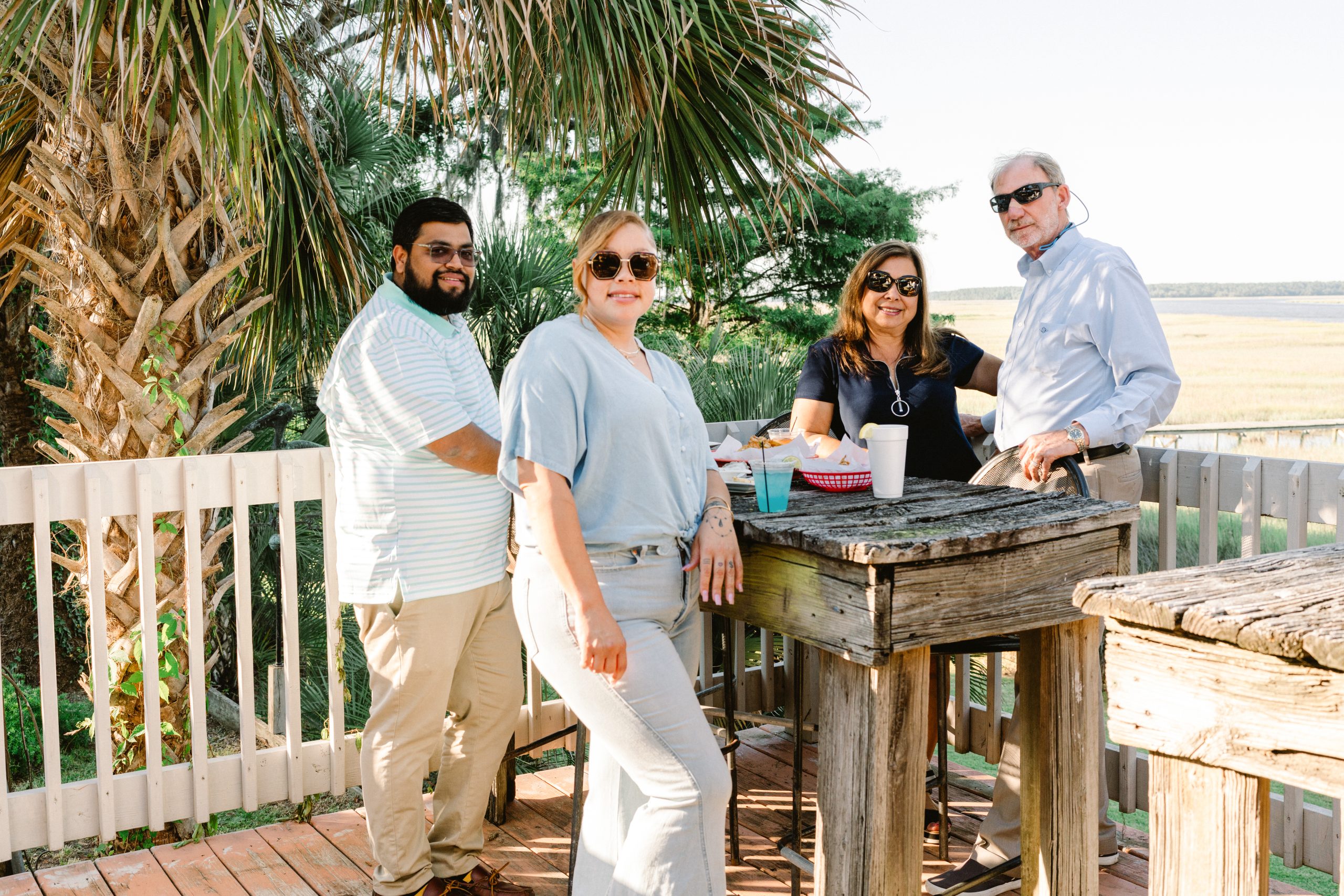 Friends enjoying the outdoor waiting area at the Sunbury Crab Company.